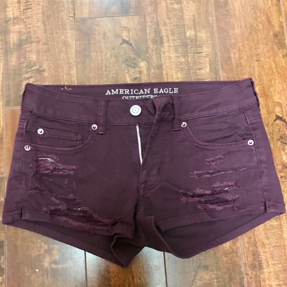 American Eagle maroon distressed shorts